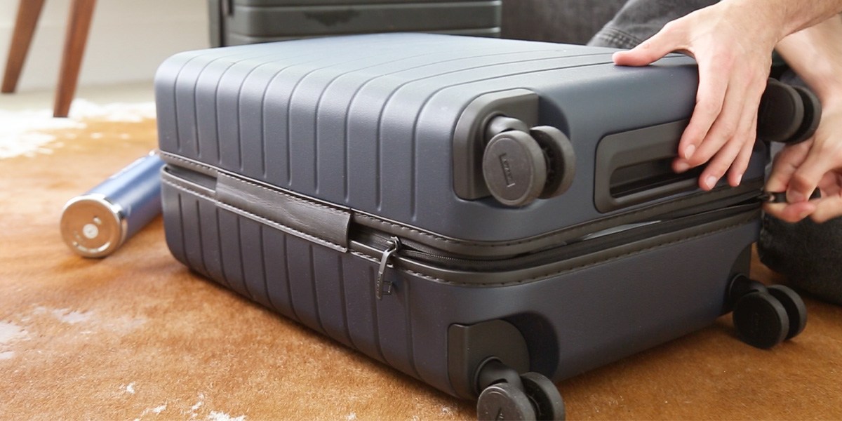 Away The Bigger Carry-On closed on floor