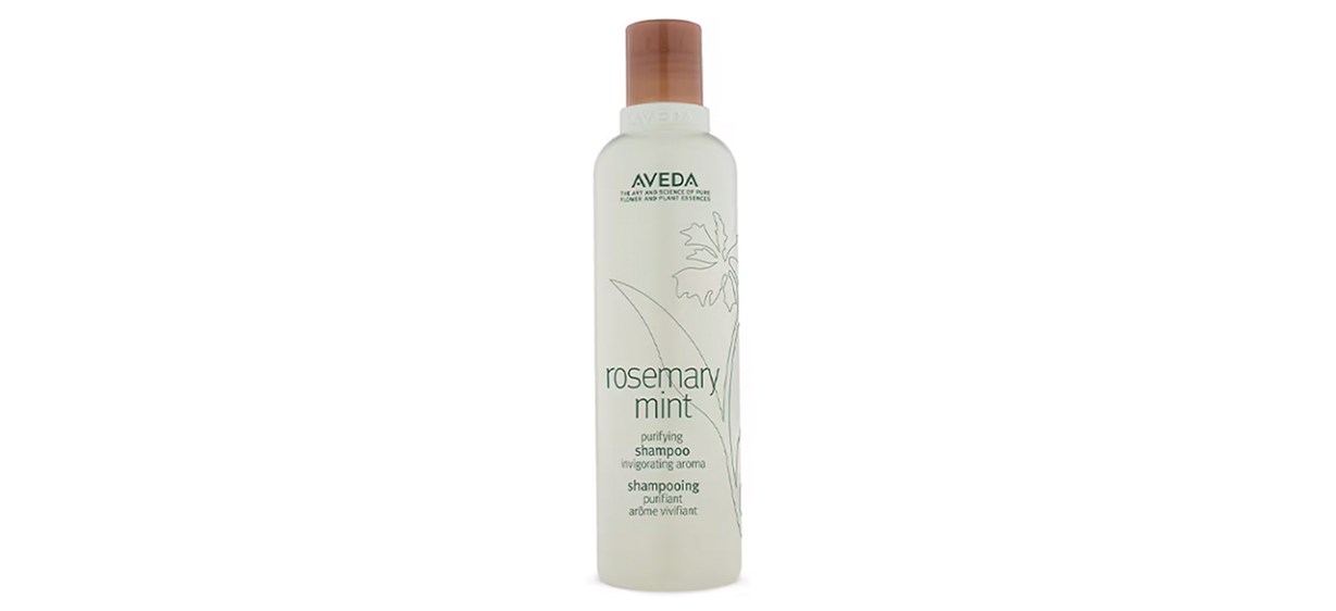 A light green bottle of Aveda Rosemary Mint Purifying Shampoo with a brown cap.