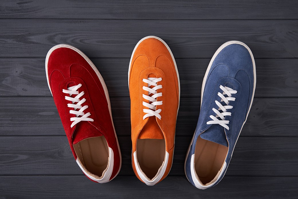 Red, orange, blue suede sneakers