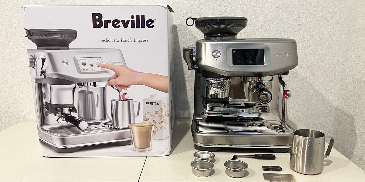 Breville the Barista Touch Impress Espresso Machine next to product box