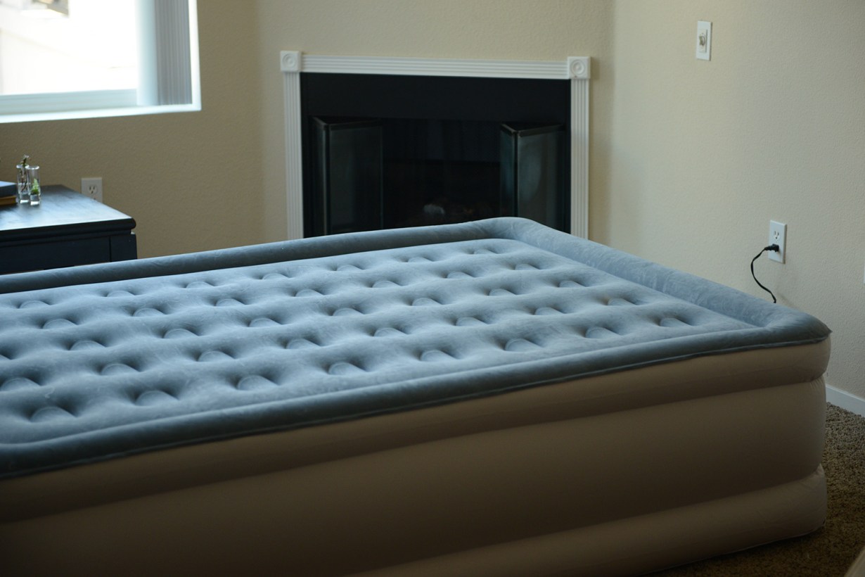 air mattress set up near a wall