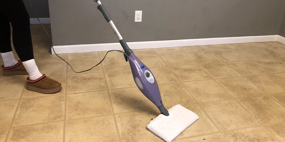 Person using Shark Steam Pocket Mop S3501 on hard floor
