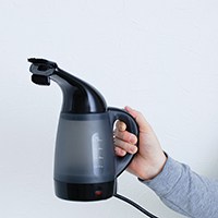 a handheld steamer