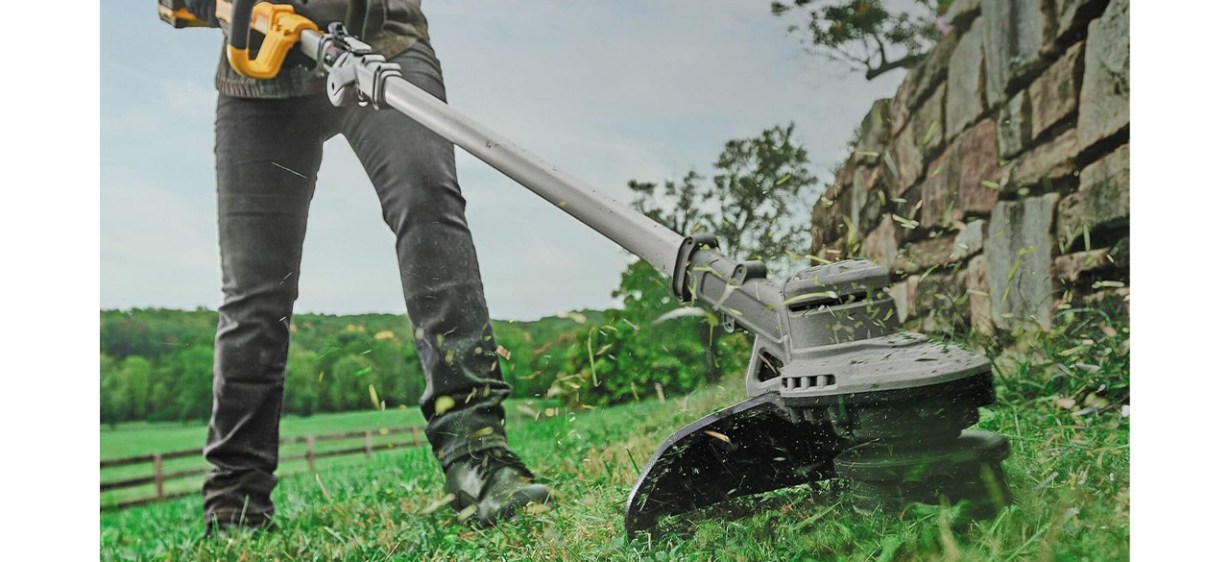 Person using DeWalt 20V Max 14-Inch String Trimmer