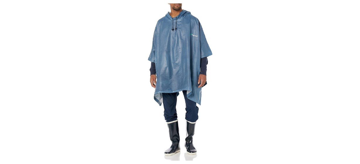 Person wearing waterproof breathable poncho