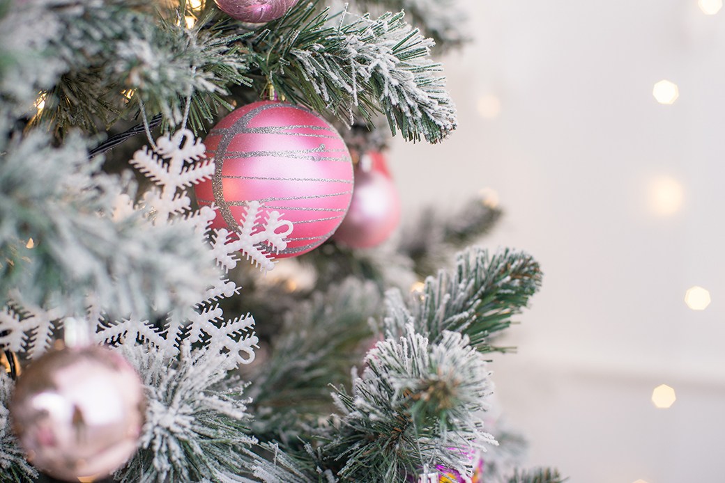 Pink ornament on Christmas tree