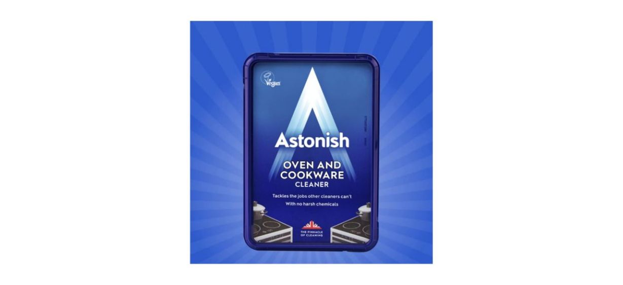 A container of oven and cookware cleaner on a blue background