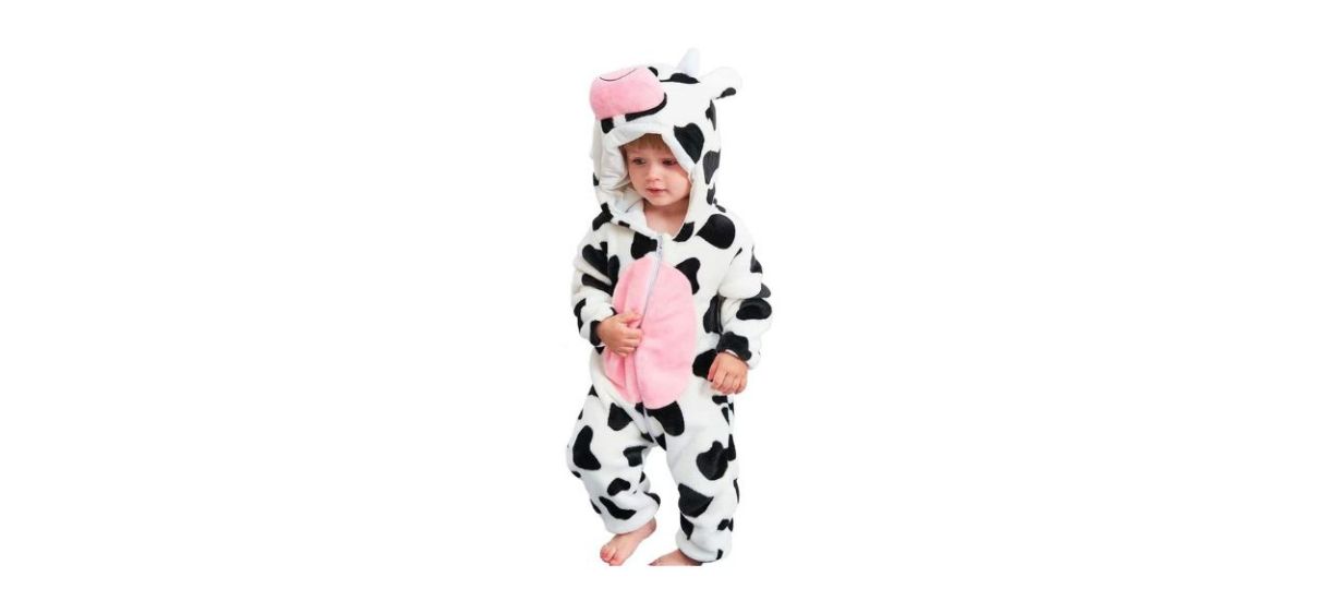 child wearing a cow costume onesie