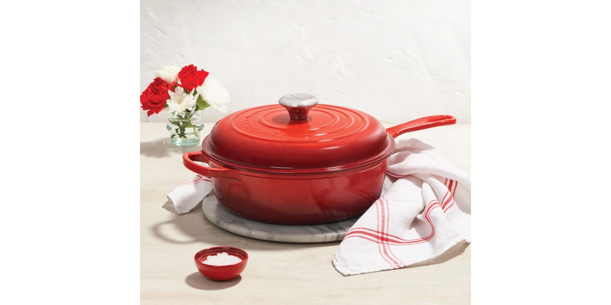 enamel cassadou set on table