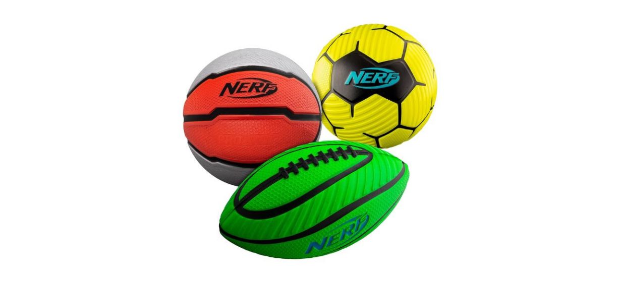 3 small foam balls; a mini foam basketball, a mini foam soccer ball and a mini foam football