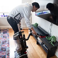 a person using a vacuum cleaner